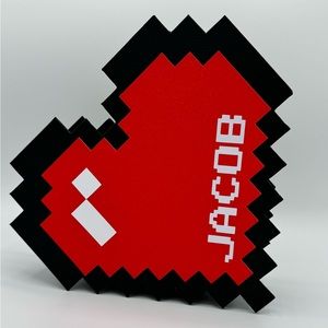 Pixelated heart-shaped box customized with magnetic side closure.